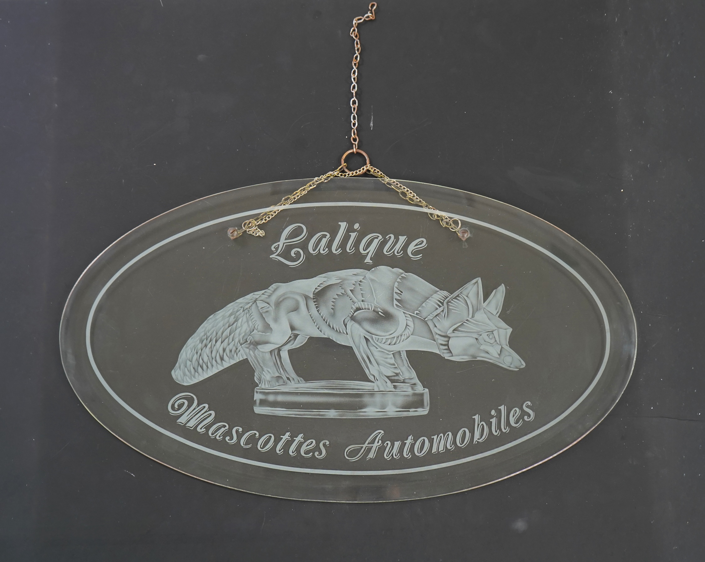 A rare boutique advertising hanging glass sign for Lalique